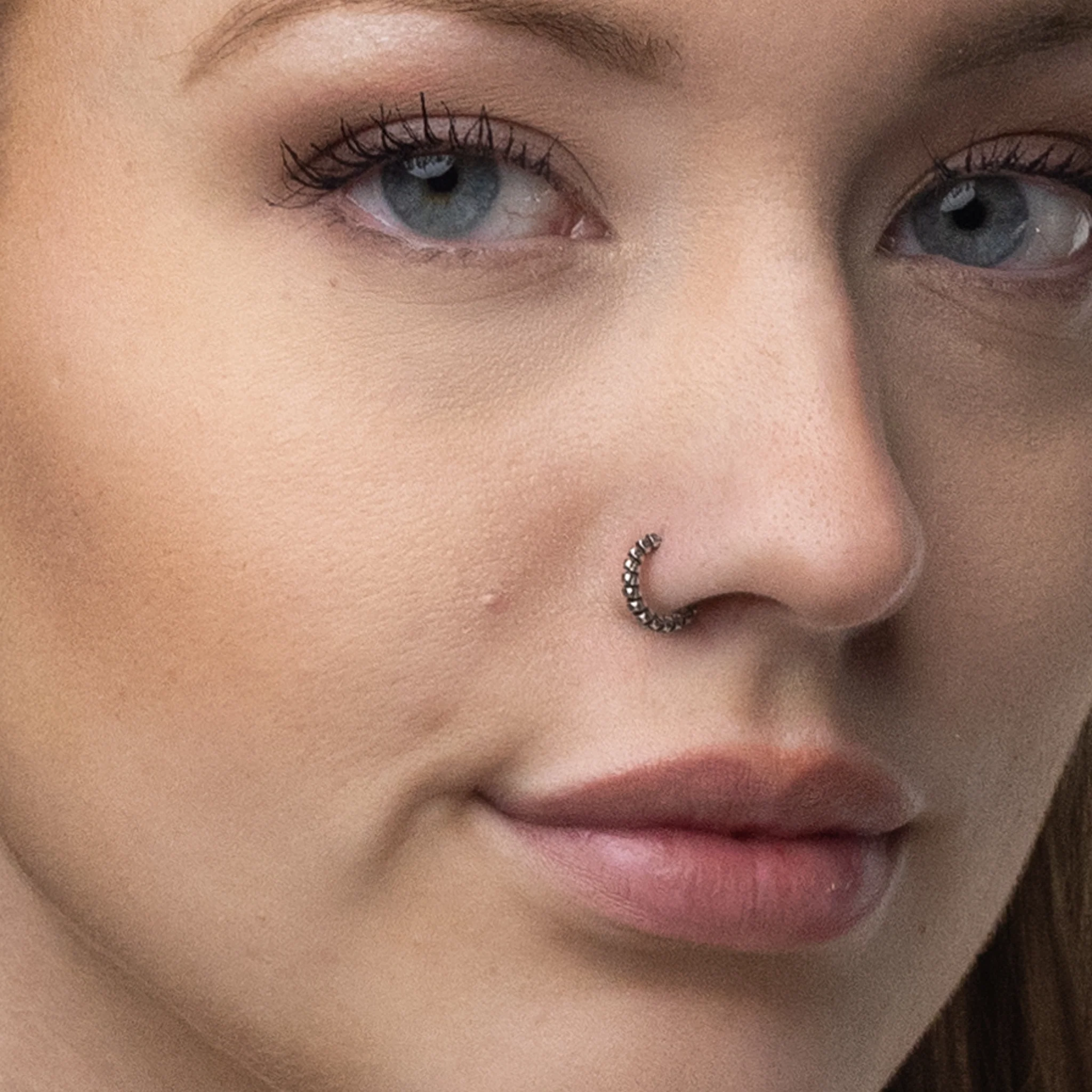 Silver Nose Ring, Segmented Design with an oxidized finish - Image 4